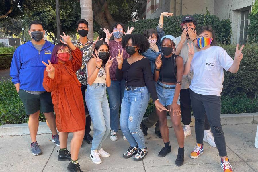 A photo of the LGBTQ CRC interns posing just outside of the physical space